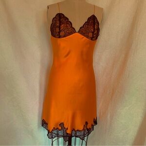 Pure silk XS/ S chemise/slip melon orange with black trim.